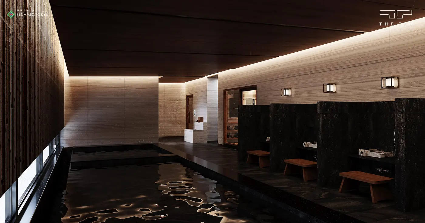 Hồ tắm nóng Onsen với ánh đèn ấm